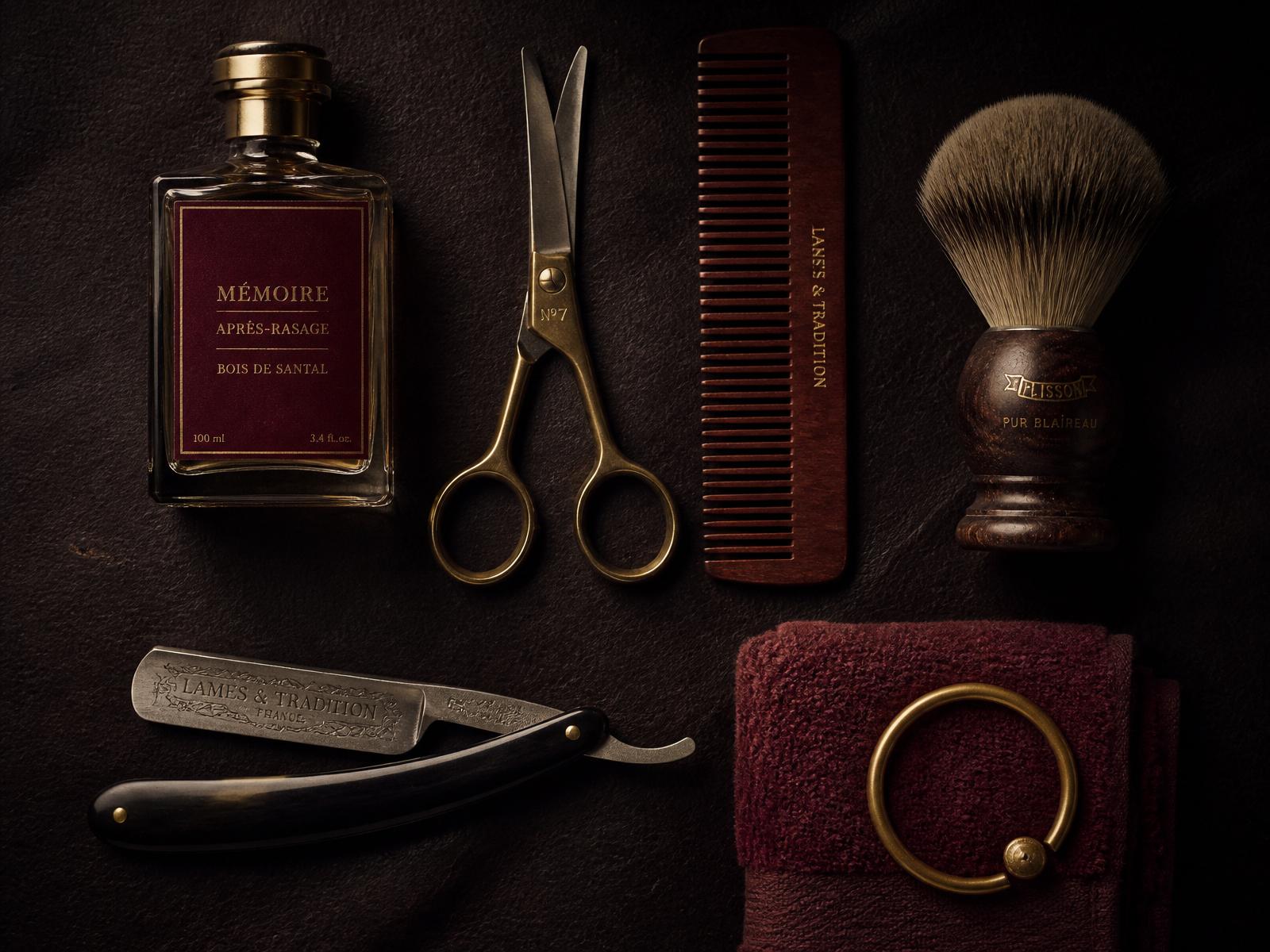 Flat lay of luxury barber tools on dark leather